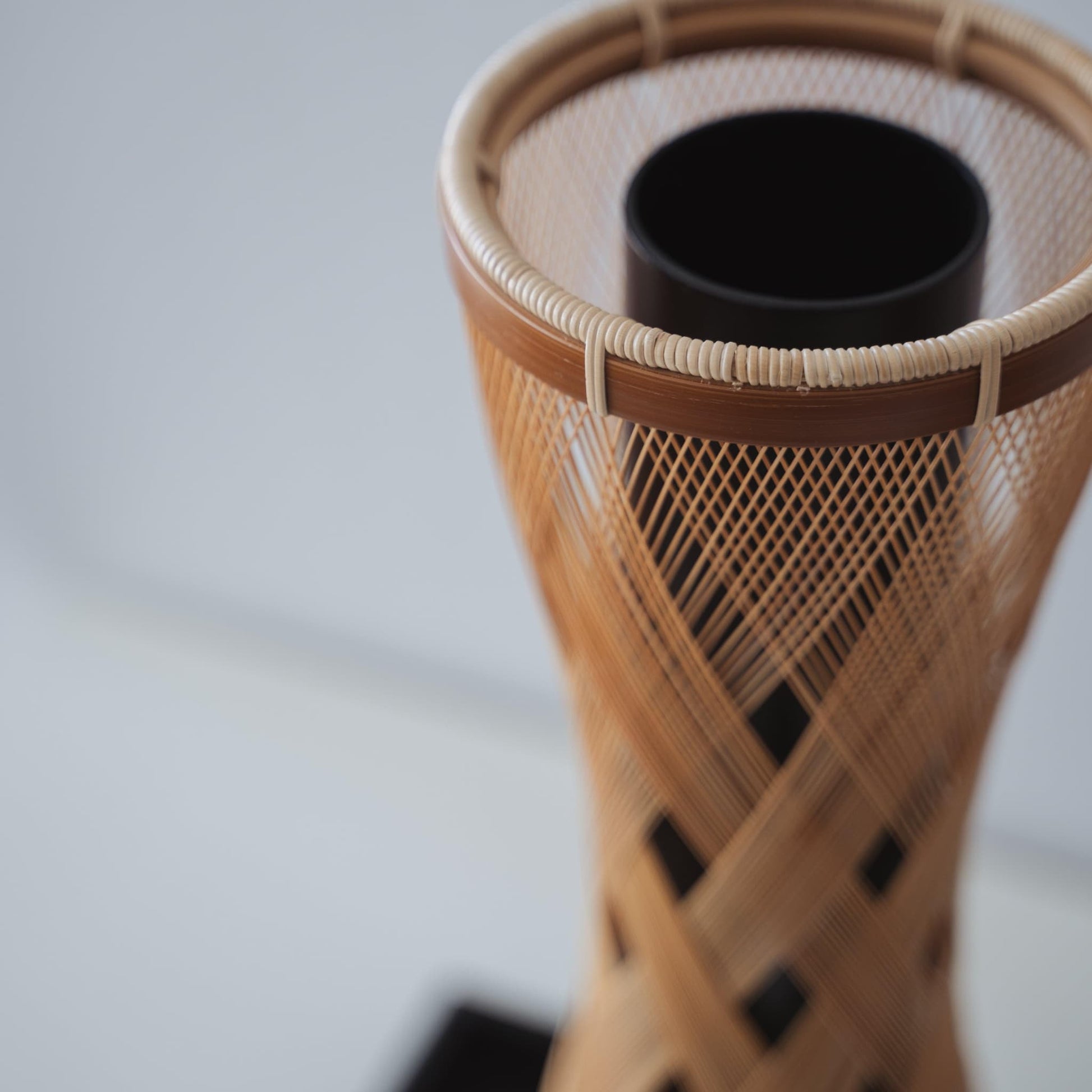 Detail of handcrafted Japanese bamboo vase "Rising Clouds"