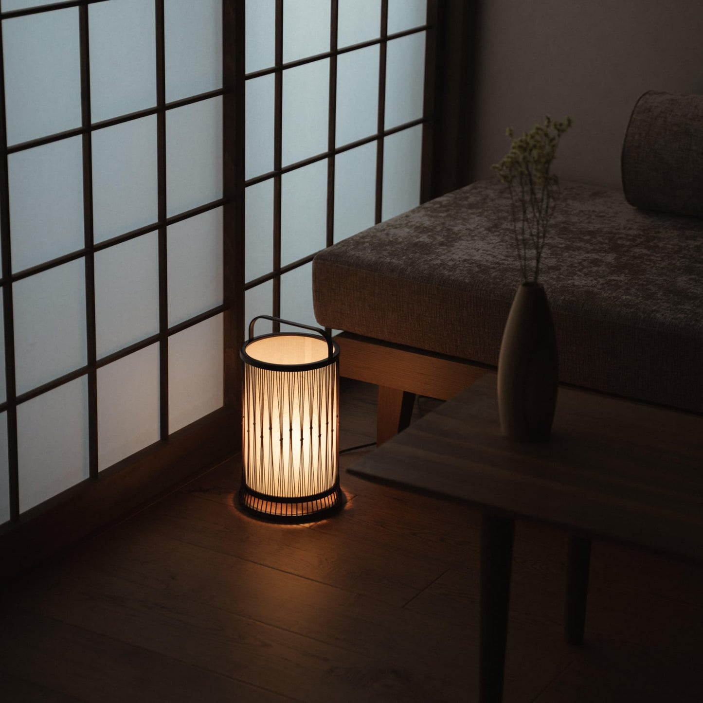 A bamboo floor lamp in a Japandi living room. 