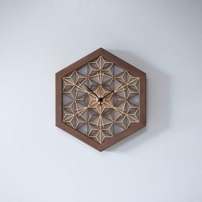 A luxurious kumiko clock made from walnut wood. The intricate design is crafted by hand, showcasing the beauty of traditional Japanese woodworking.