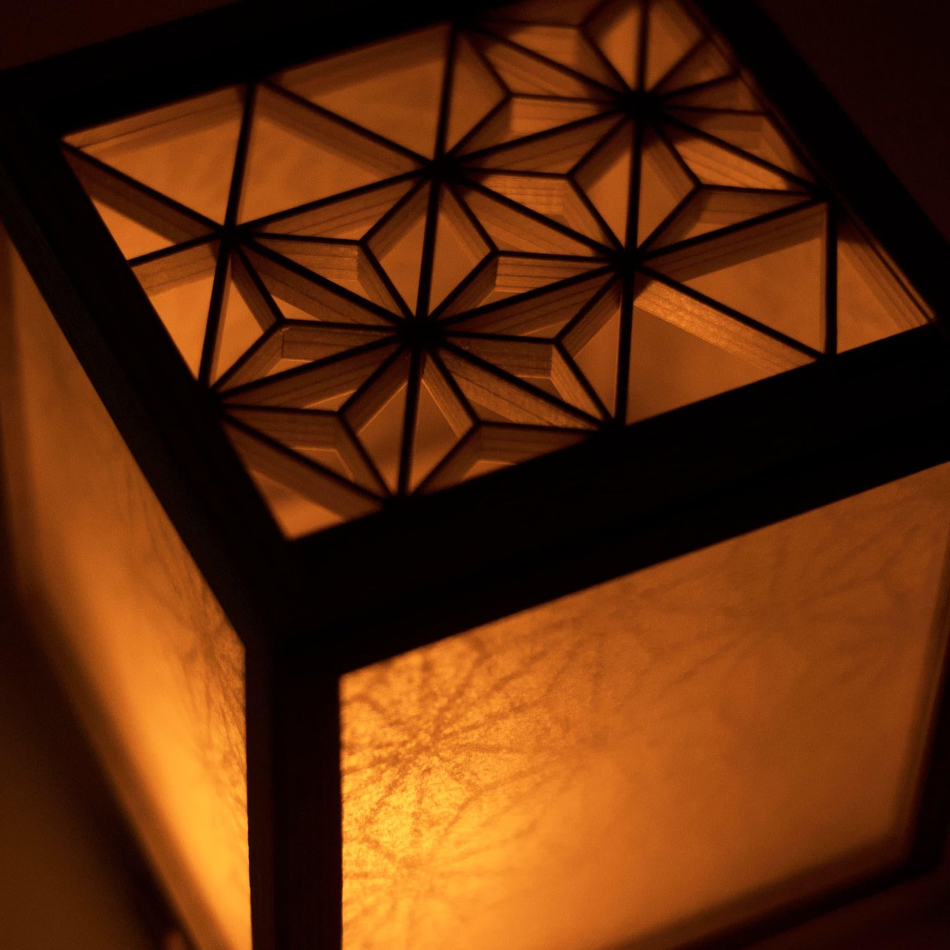 A detailed view of the intricate kumiko pattern on a medium-sized lighting cover.