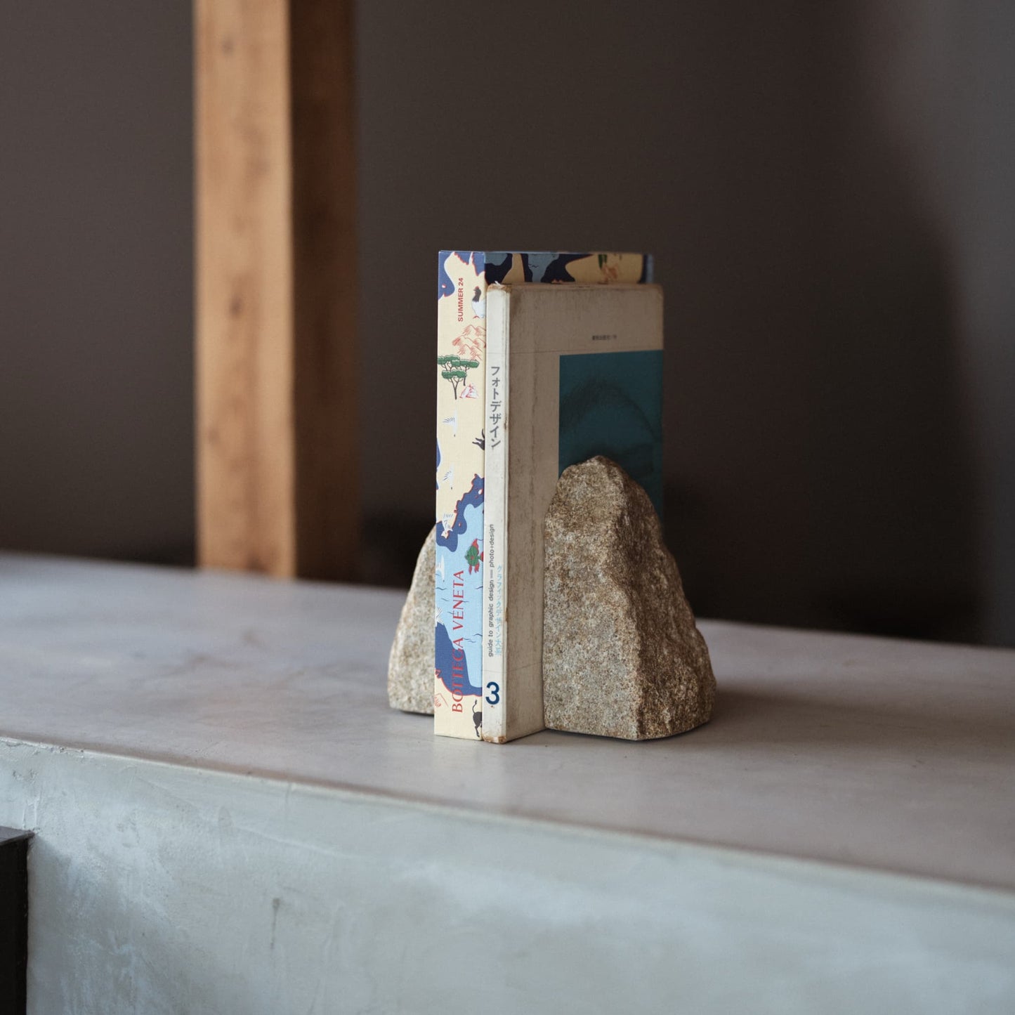 Japanese Aji Stone Book End on a white table