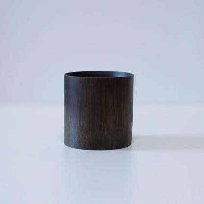 Black Japanese bamboo cup crafted with traditional techniques from Kyoto, Japan.