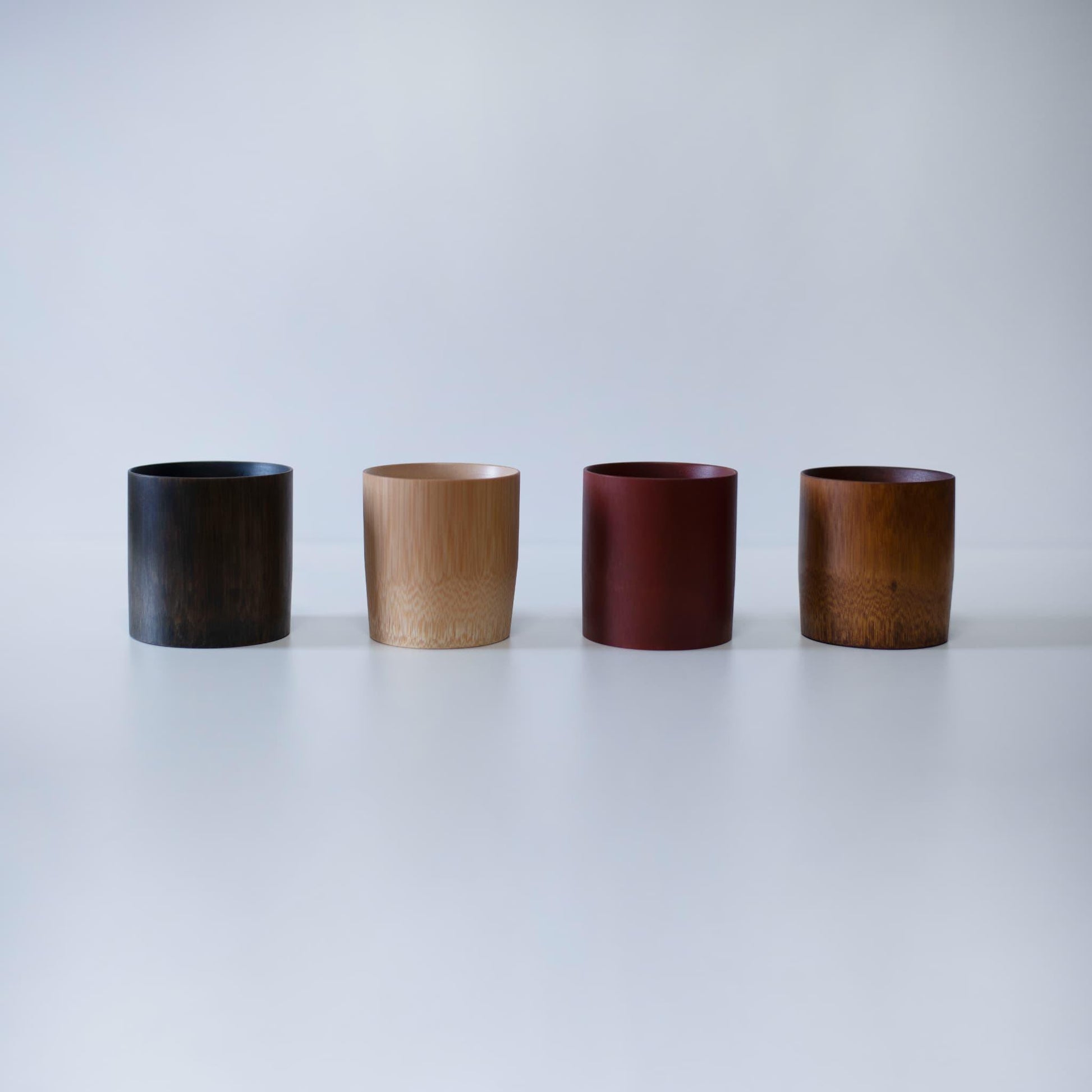 Four bamboo cups in different colors, crafted with traditional techniques from Kyoto, Japan.