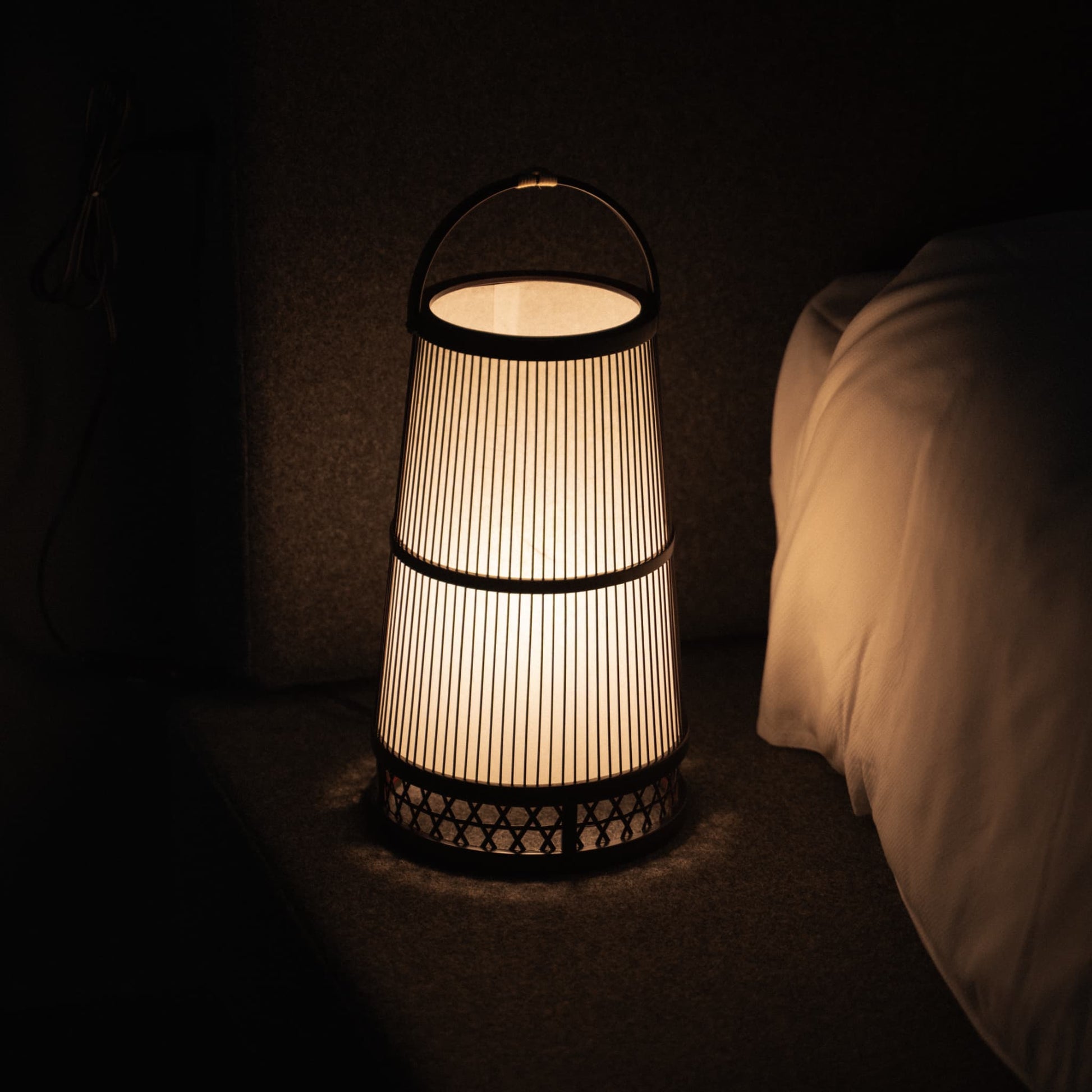 Japanese Bamboo Floor Lamp "Hagoromo":  illuminating a minimalist Japandi-style Bedroom.