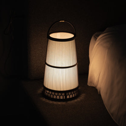 Japanese Bamboo Floor Lamp "Hagoromo":  illuminating a minimalist Japandi-style Bedroom.