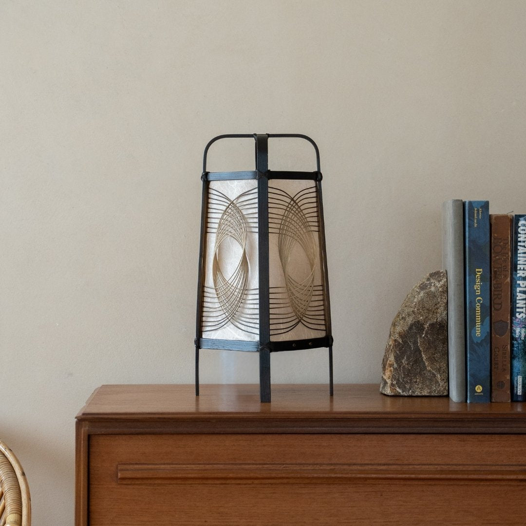 Japanese Bamboo Floor Lamp "Sunlight" on a wood shelf in Japandi room - Unique bamboo night lamp for bedroom