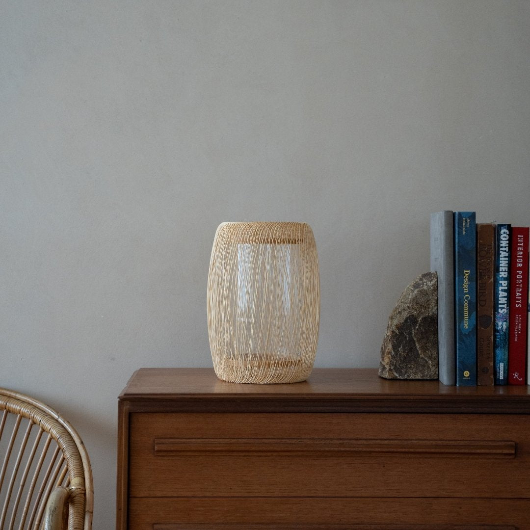 Japanese Bamboo Flower Vase "Cocoon" on a wood shelf in Japandi room -  Ikebana flower vase with wabi-sabi aethetics