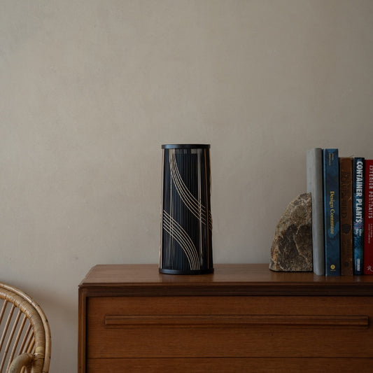 Japanese Bamboo Flower Vase “Flowing Water” on a wood shelf in Japandi room - Unique ikebana flower vase with wabi-sabi