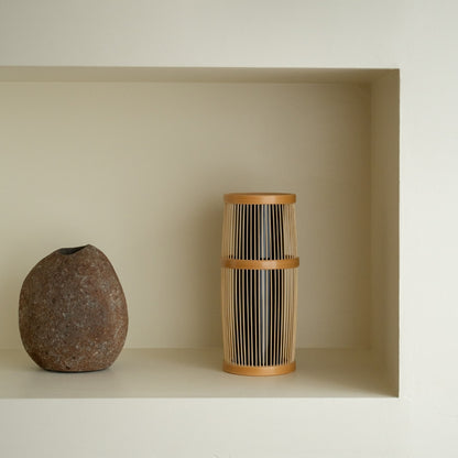 Japanese Bamboo Flower Vase “Shiori” on a white shelf - Japandi style ikebana flower vase with wabi-sabi aesthetics