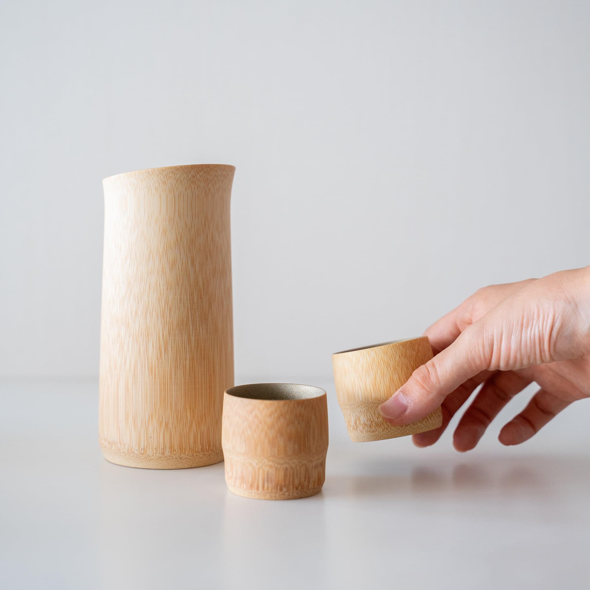 Japanese Sake pitcher and cups crafted from natural Japanese bamboo in Kyoto.