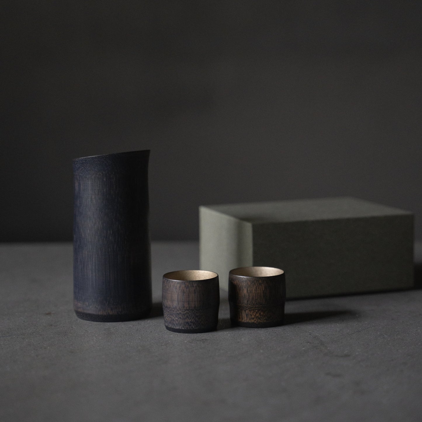 Gift set of Japanese bamboo sake pitcher and cups, crafted with traditional techniques from Kyoto, Japan. 