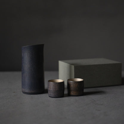 Gift set of Japanese bamboo sake pitcher and cups, crafted with traditional techniques from Kyoto, Japan. 