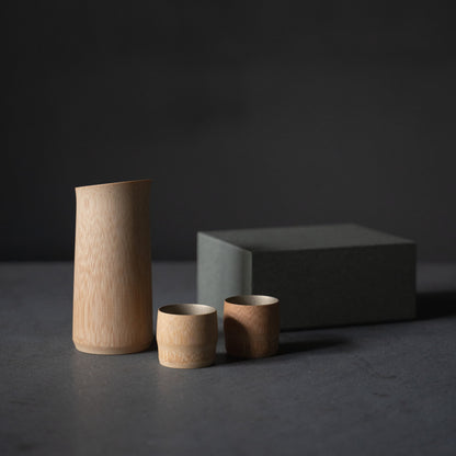 Gift set of Japanese bamboo sake pitcher and cups, crafted with traditional techniques from Kyoto, Japan. 