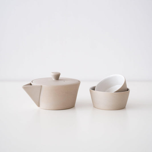 Japanese Banko-yaki nesting tea set with a white teapot and two cups, with a history of several hundred years, presented in a simple paper box.