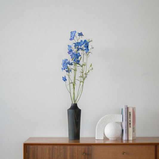 Japanese Cedar Ikebana Vase Indigo 02 on a wood console table in Japandi living room
