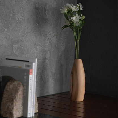Japanese Ikebana vase on a console table in Japandi living room