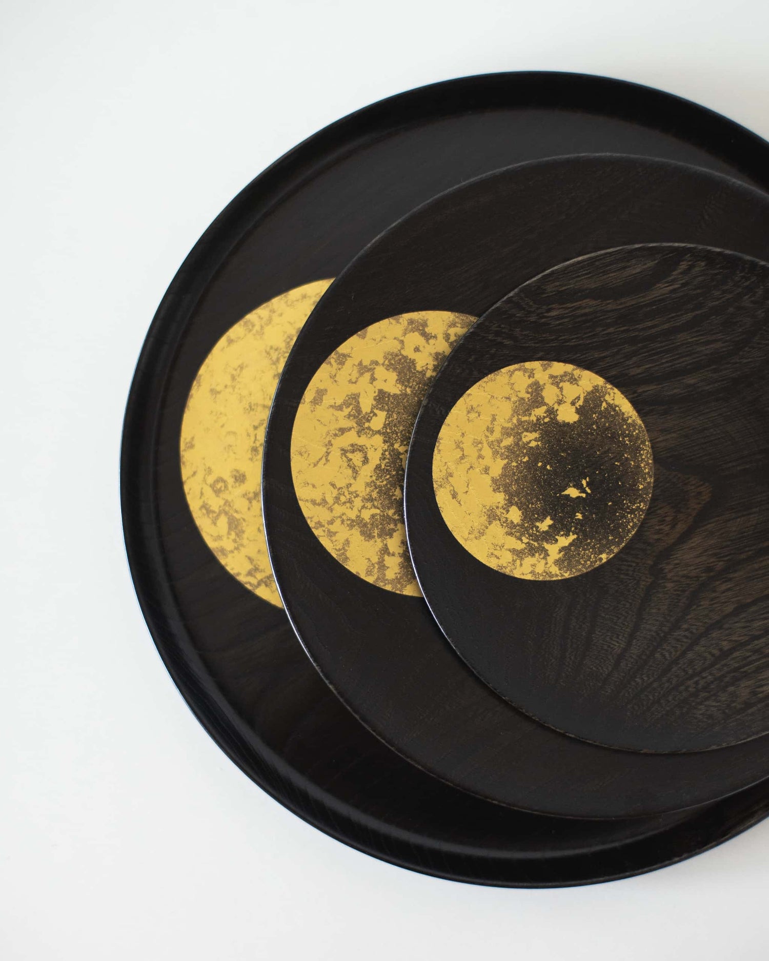 Japanese gold leaf plates on a white table