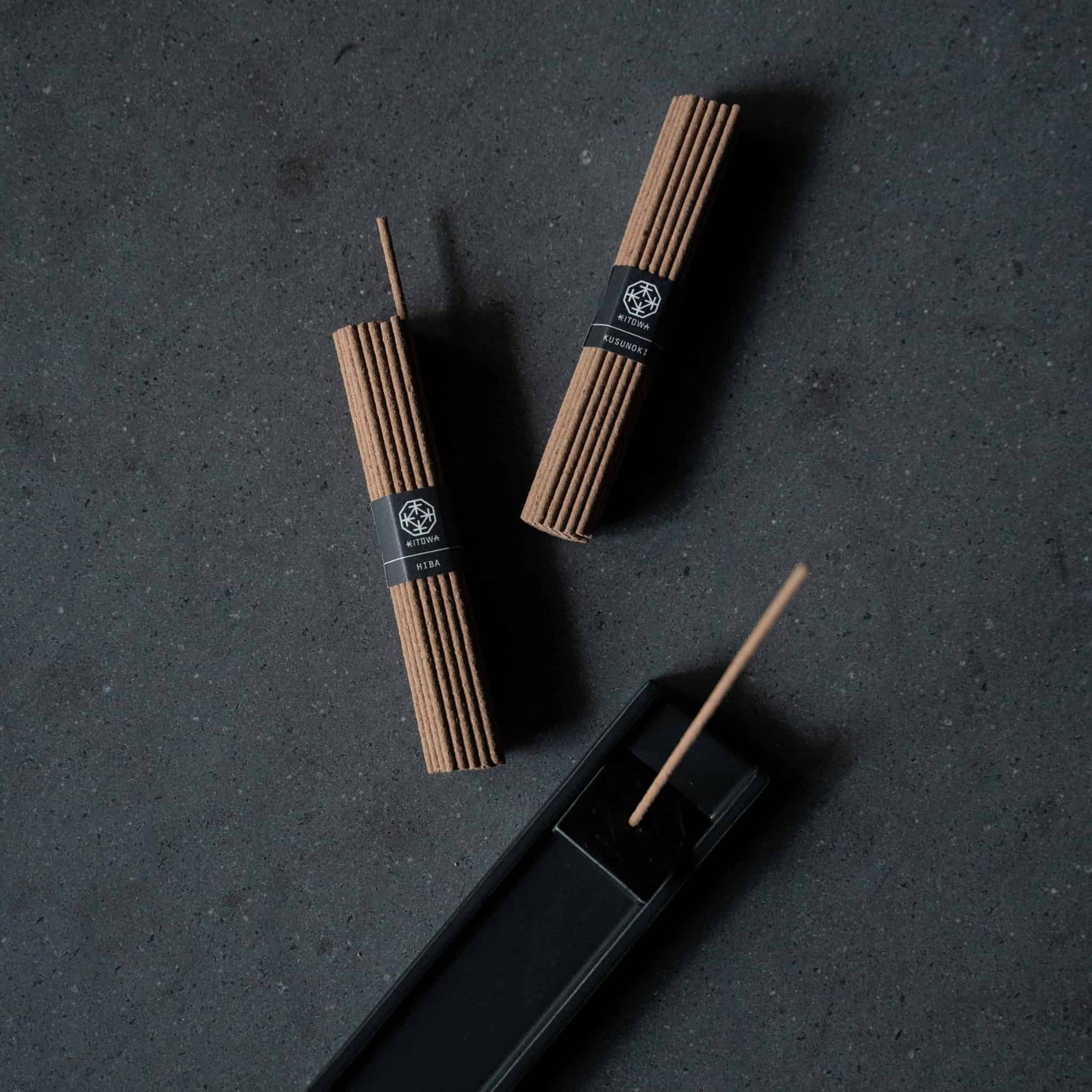 Japanese A INCENSE STICKS and A Plate on A Grey Table