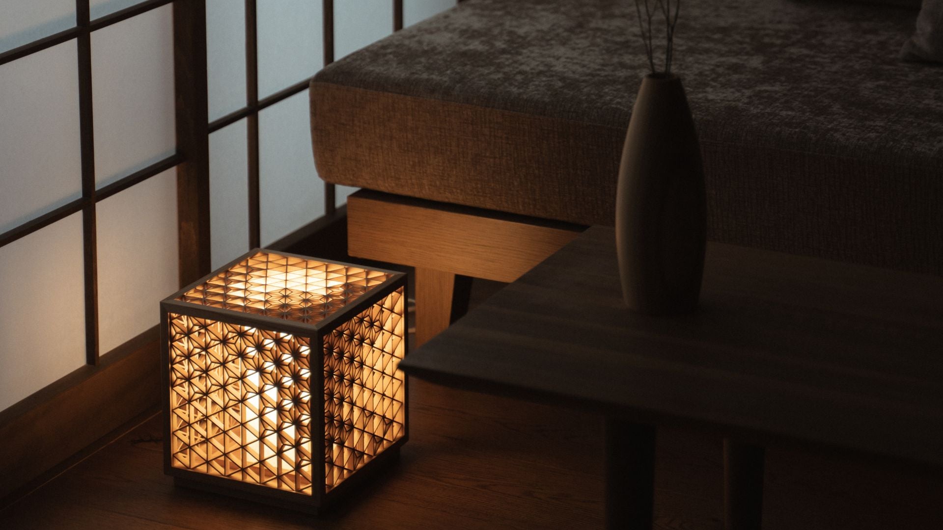 Traditional Japanese lamp handcrafted with 600 pieces of Akita cedar using Kumiko joinery techniques. Illuminates a Japandi-style living room with low sofa, table, and shoji screens.