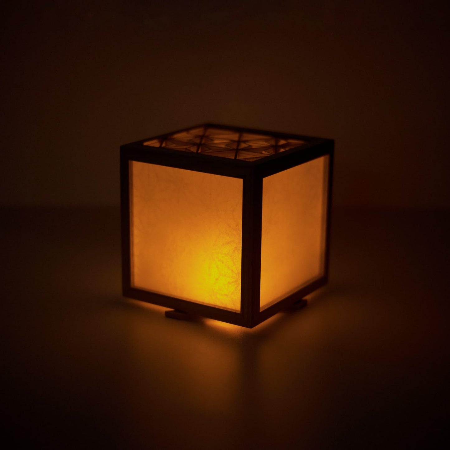 A medium-sized kumiko lighting cover, showcasing the intricate wooden latticework and the unique texture of washi paper.