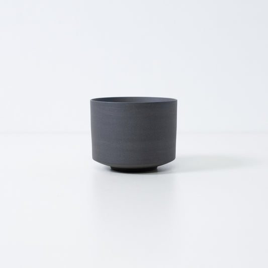 Japanese matcha bowl black, Banko ware chawan handcrafted from iron-rich clay for vivid green tea.