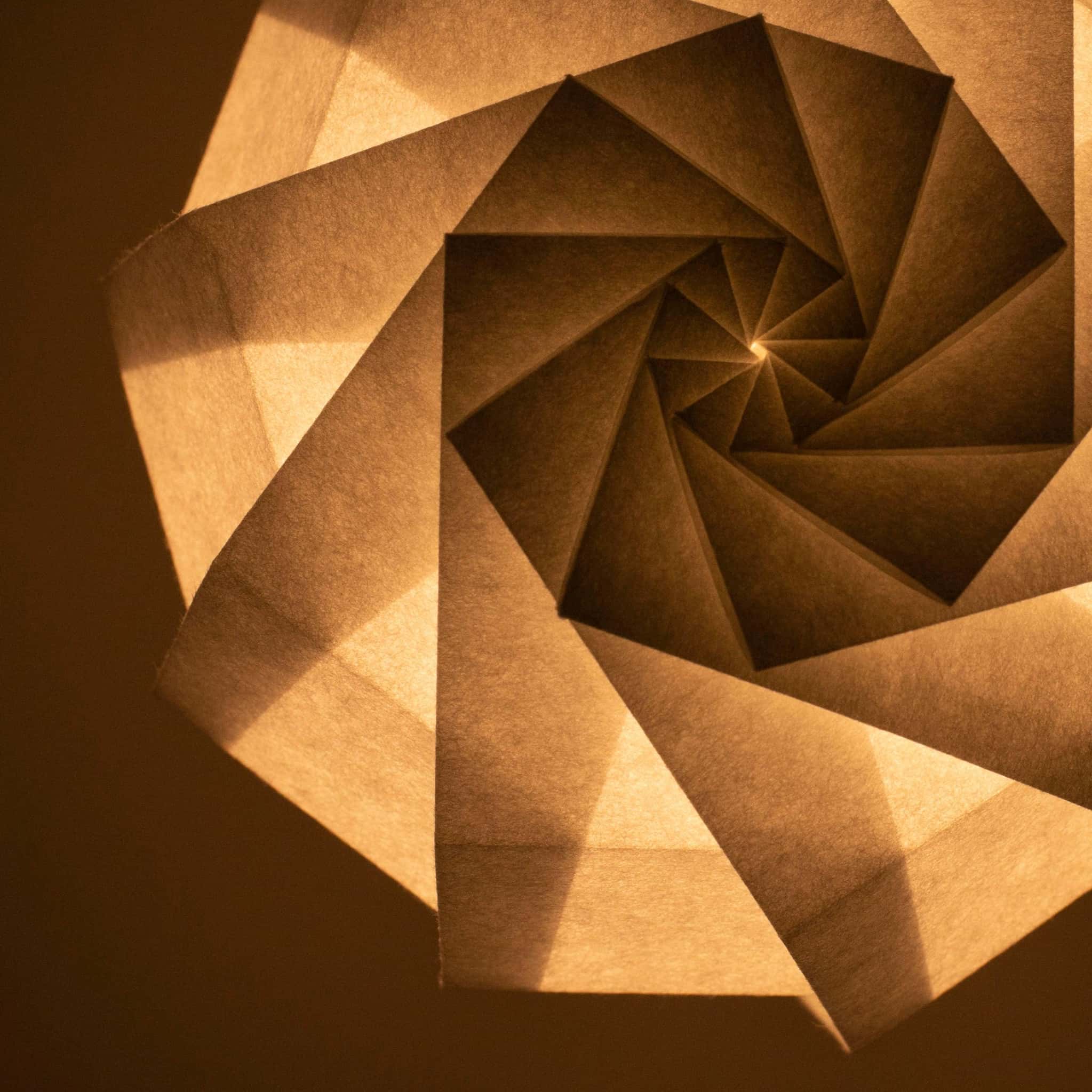 Design of unique Japanese frameless table lamp, crafted with origami techniques, adding a touch of modern elegance and soft illumination to any space.