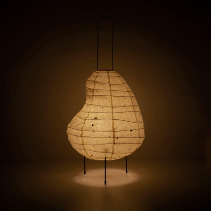 Unique bean-shaped paper floor lamp crafted with Gifu lantern techniques and 1300-year-old Mino washi paper.