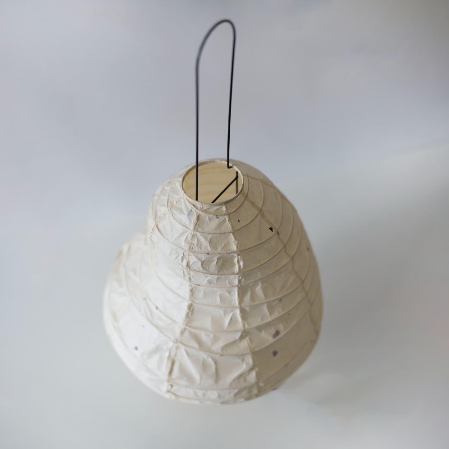 Unique Japanese paper stand light, handcrafted with Gifu lantern techniques and traditional washi paper, showcasing a beautiful blend of heritage and modern design.