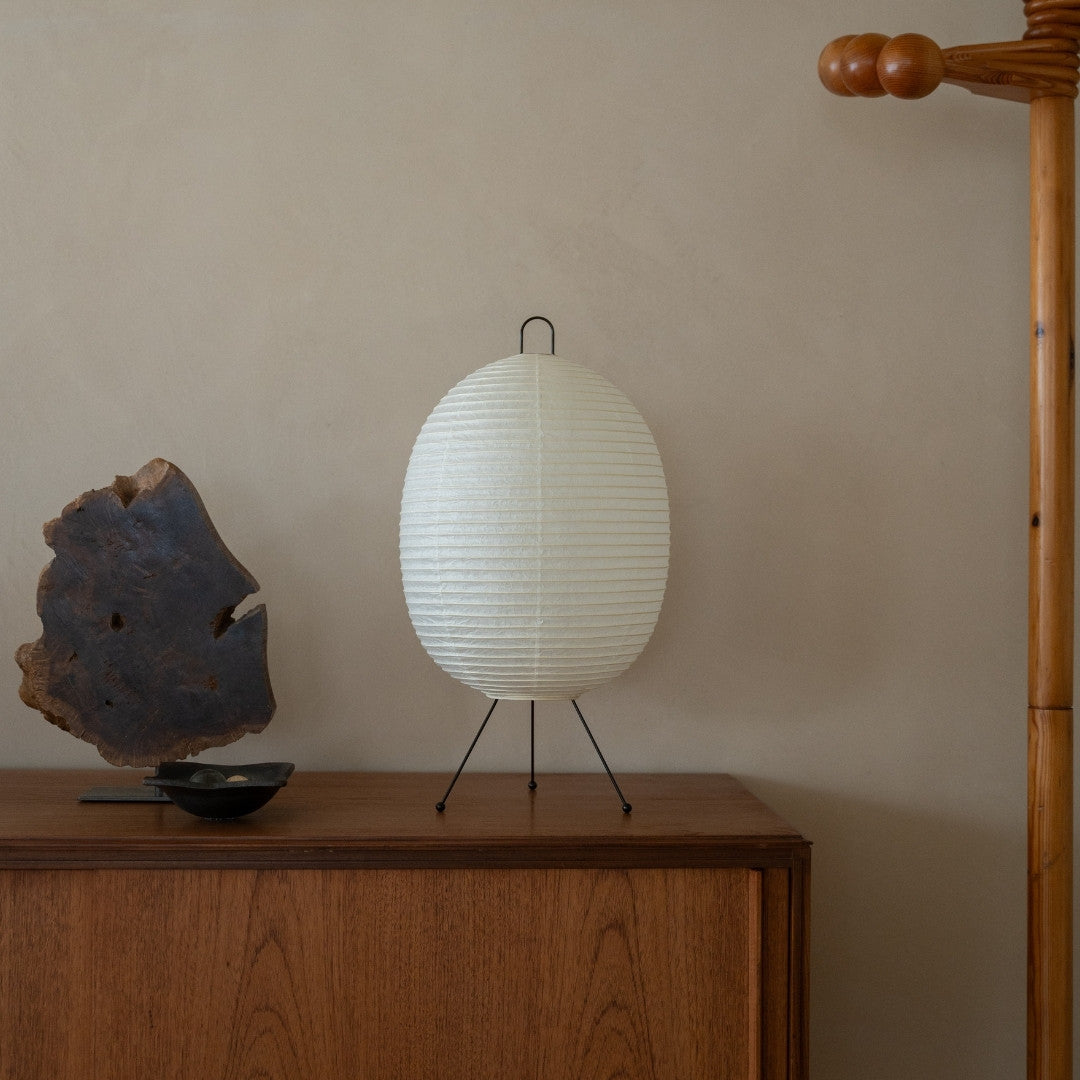 Japanese Paper Floor Lamp "Chochin lamp 02" on a wood shelf in Japandi style living room - Japanese paper lantern for Japandi living room