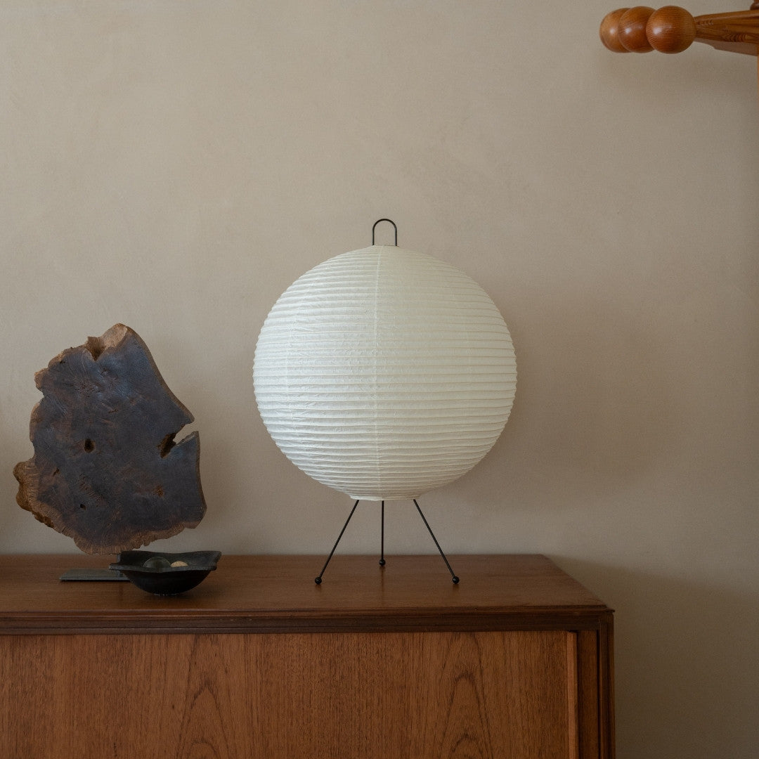 Japanese Paper Floor Lamp "Chochin lamp 03" on a wood shelf in Japandi style living room - white paper lamp for Japandi living room