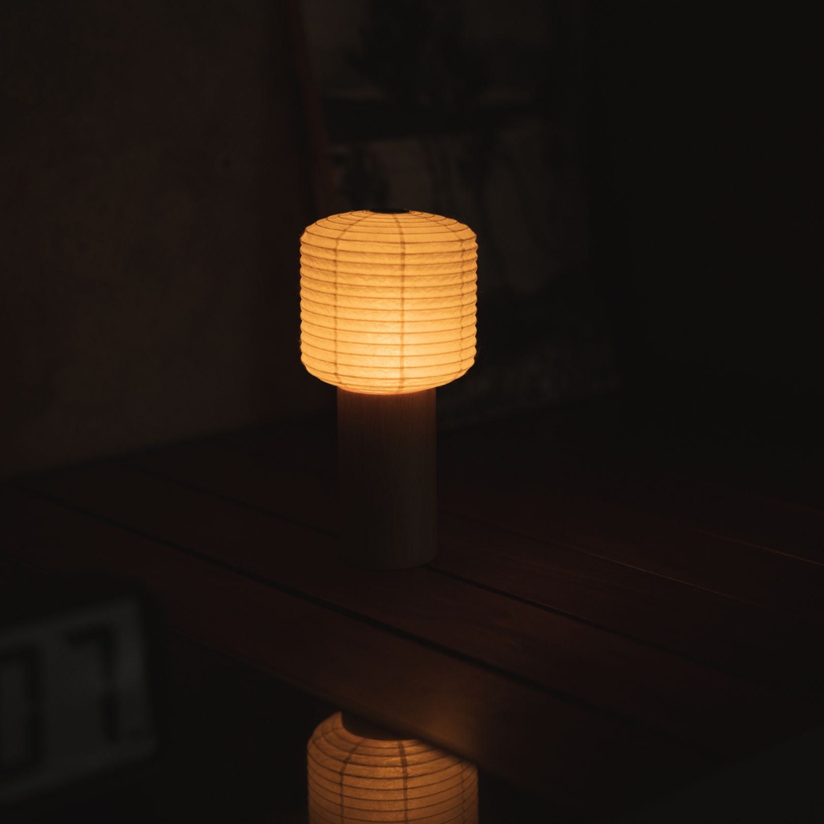 Japanese Paper Table Lamp "TORCHIN SQUARE" Placed on a Living Room Console Table