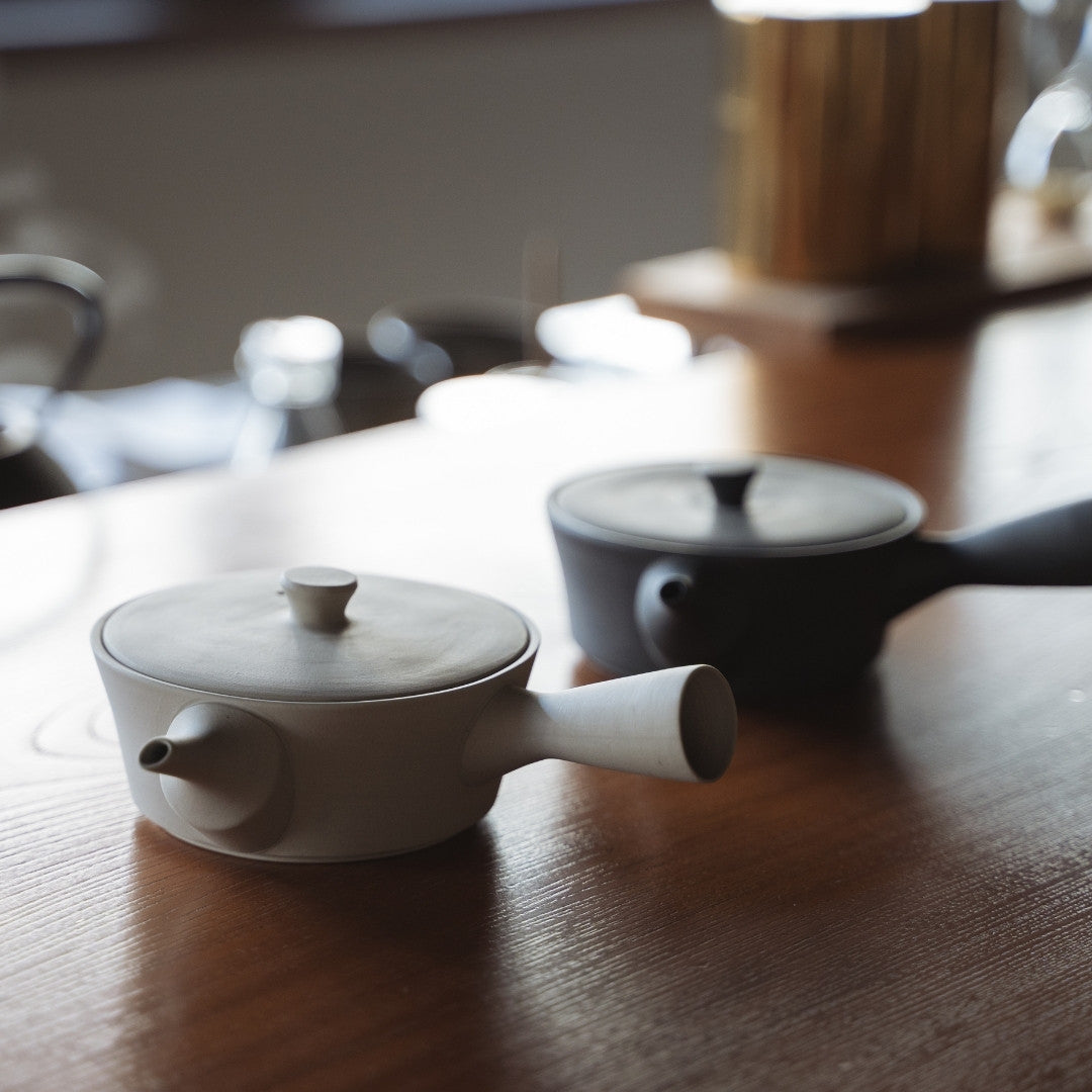 Handcrafted Japanese Sencha Teapot Black & White on the wooden table in a zen room