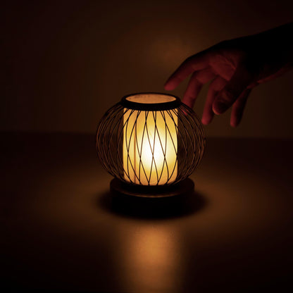 Minimalist bamboo table lamp on a table in a Japandi style bedroom, showcasing 800 years of craftsmanship from Shizuoka, Japan.