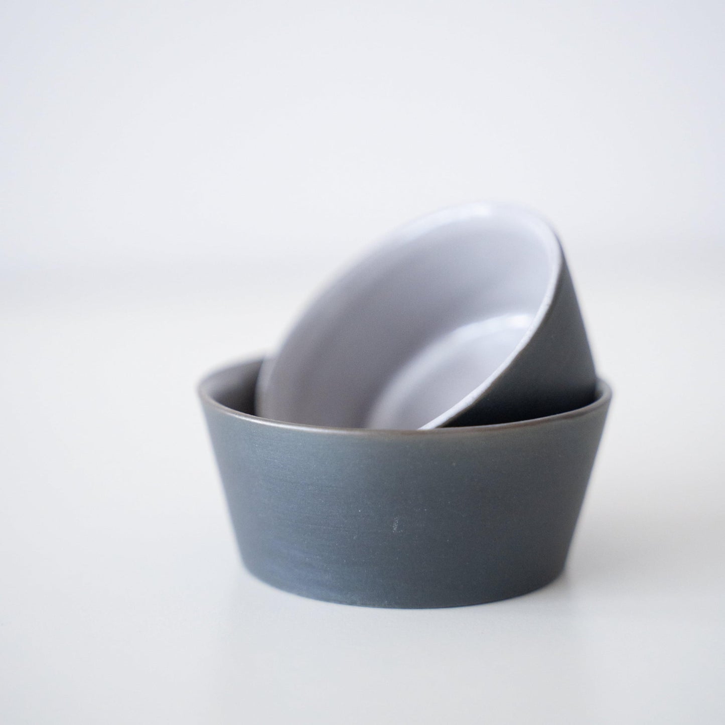 Two Japanese Banko-yaki black cups, with a history of several hundred years.