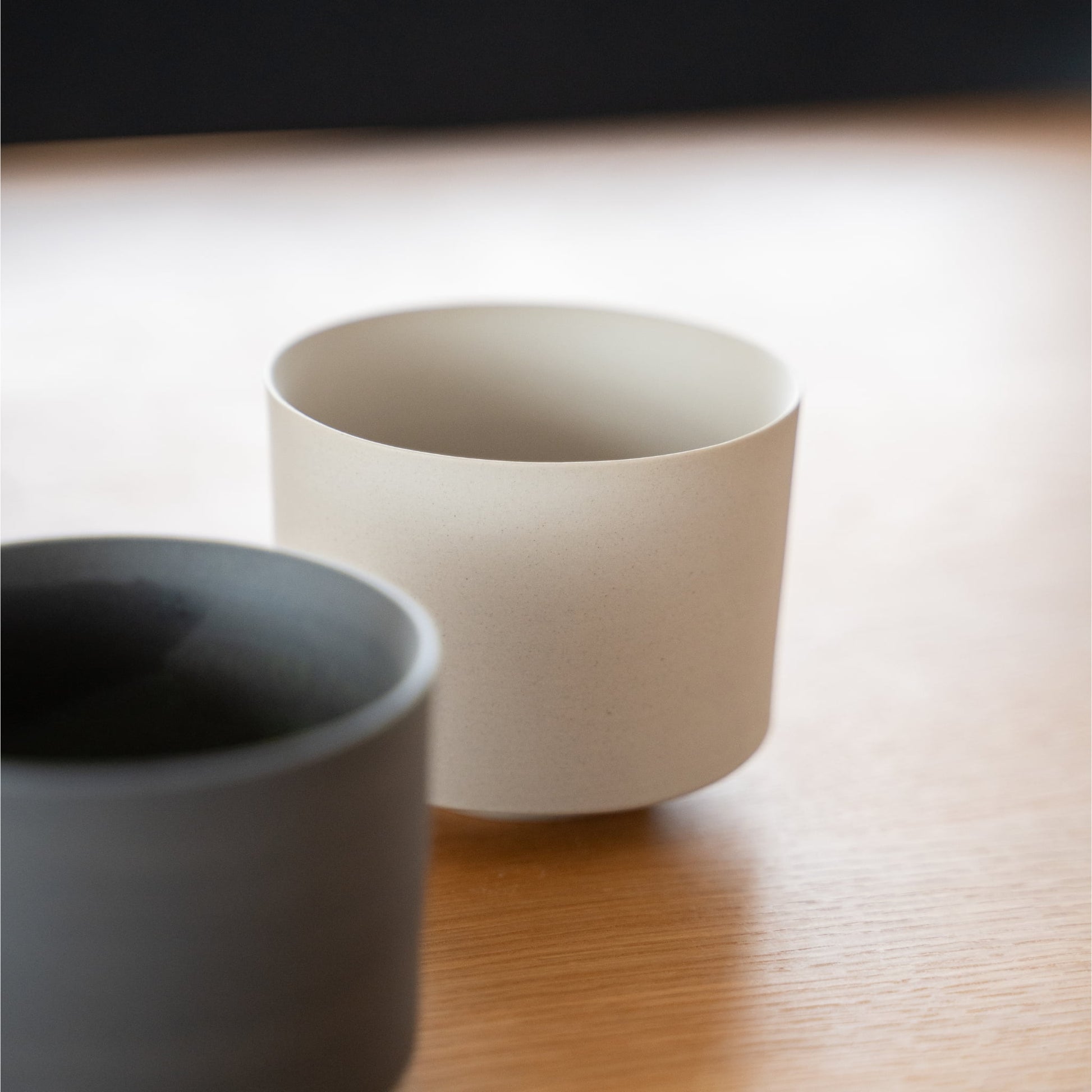 A white matcha bowl on a dining table