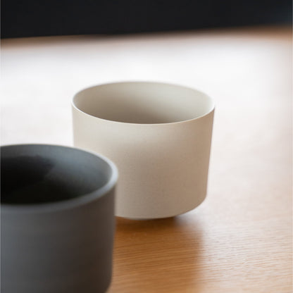 A white matcha bowl on a dining table