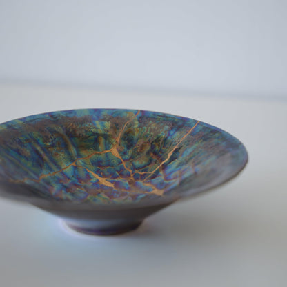 Close-up of Kintsugi Bowl "Blue Moon" side, highlighting the intricate Kintsugi repairs