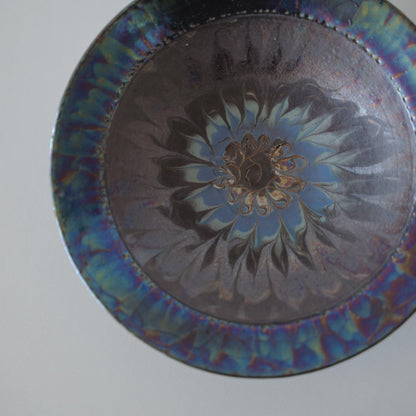 Overhead view of Kintsugi Bowl "Blue Rose Nebula" against a white background