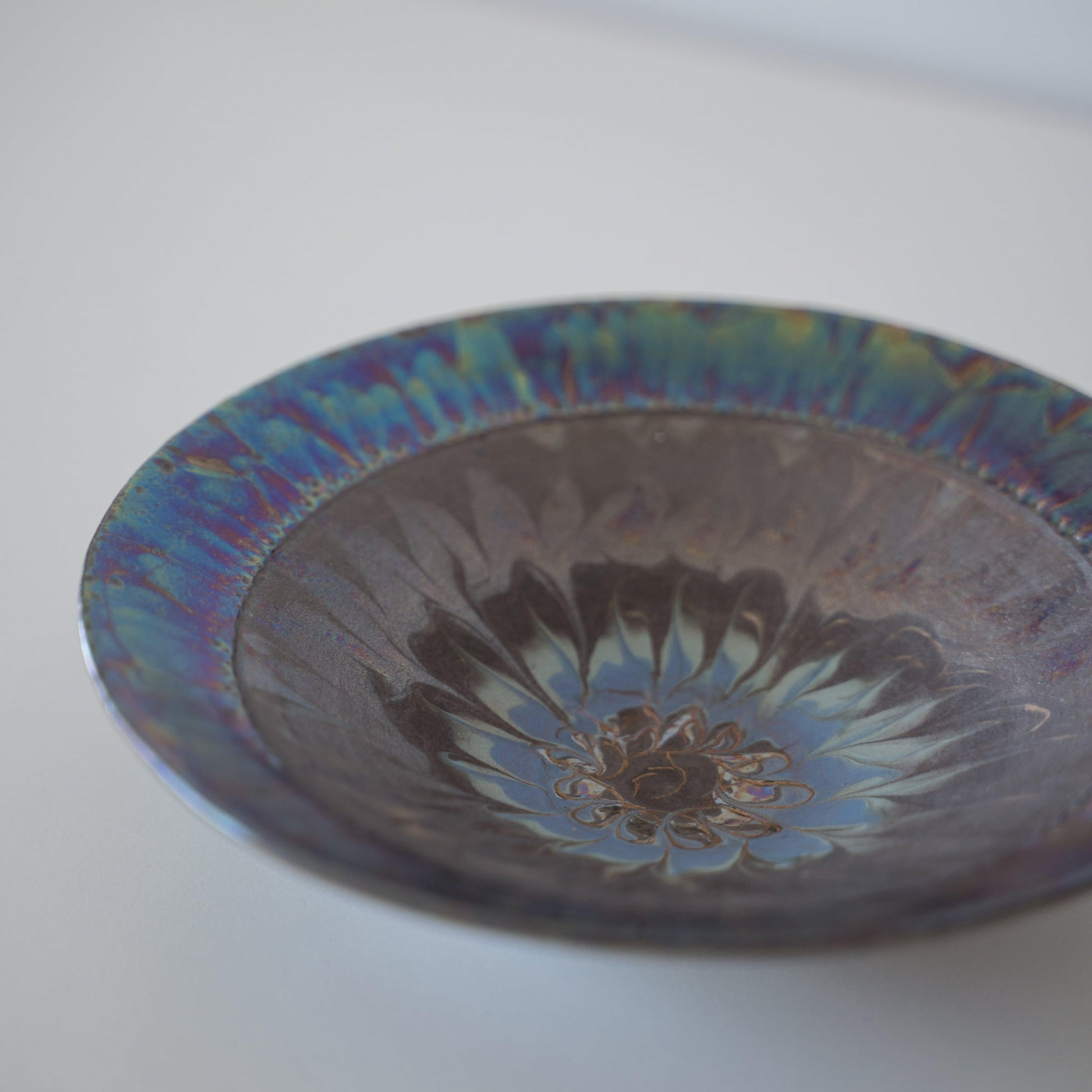 Top view close-up of Kintsugi Bowl "Blue Rose Nebula", showcasing the unique "Supernova" pattern