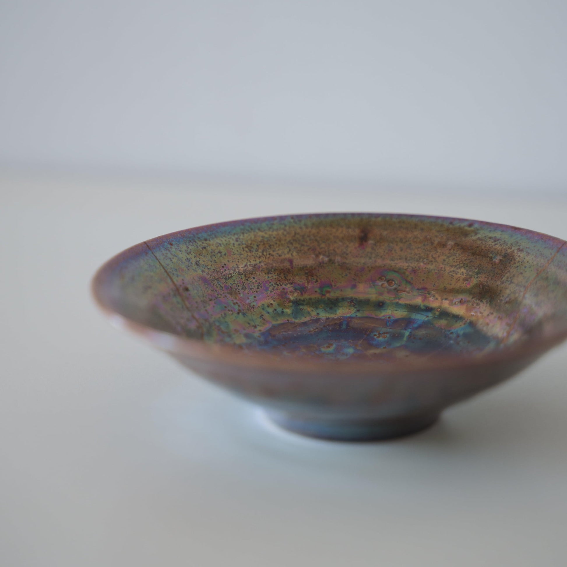 Close-up of Kintsugi Bowl "Supernova" side, highlighting the intricate Kintsugi repairs