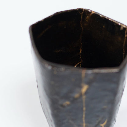 Top view of Pentagon Kintsugi Cup "Tenmoku" Black 01, showcasing its unique pentagonal shape