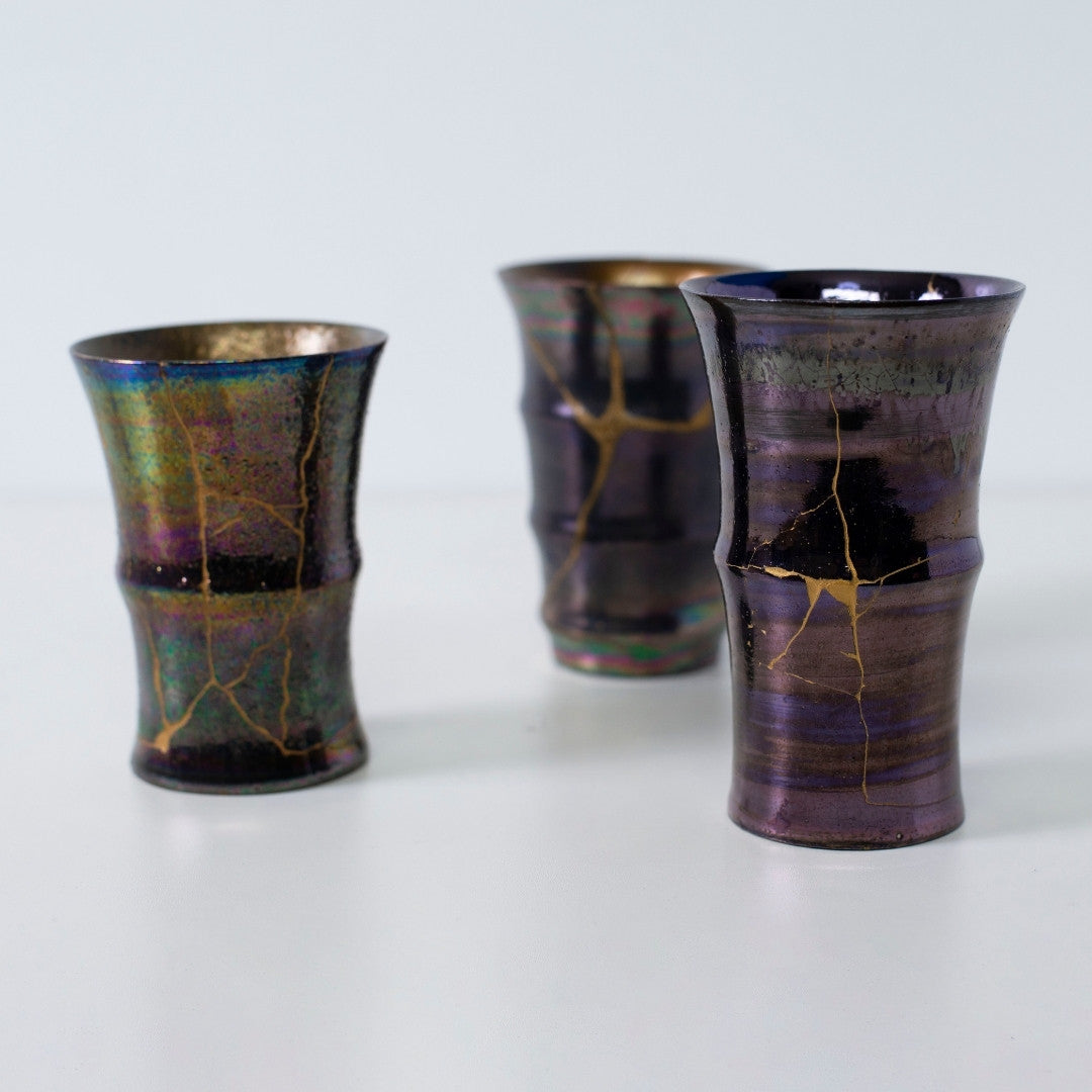 Kintsugi art cups with gold repair in magenta and rainbow glaze | wabi sabi pottery collection