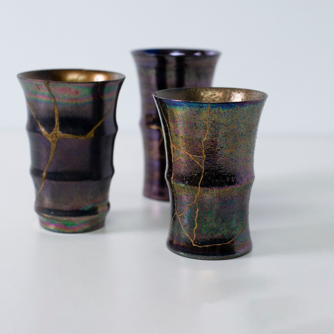 Kintsugi cups in rainbow and magenta luster | wabi sabi kintsugi pottery by Taku Nakano