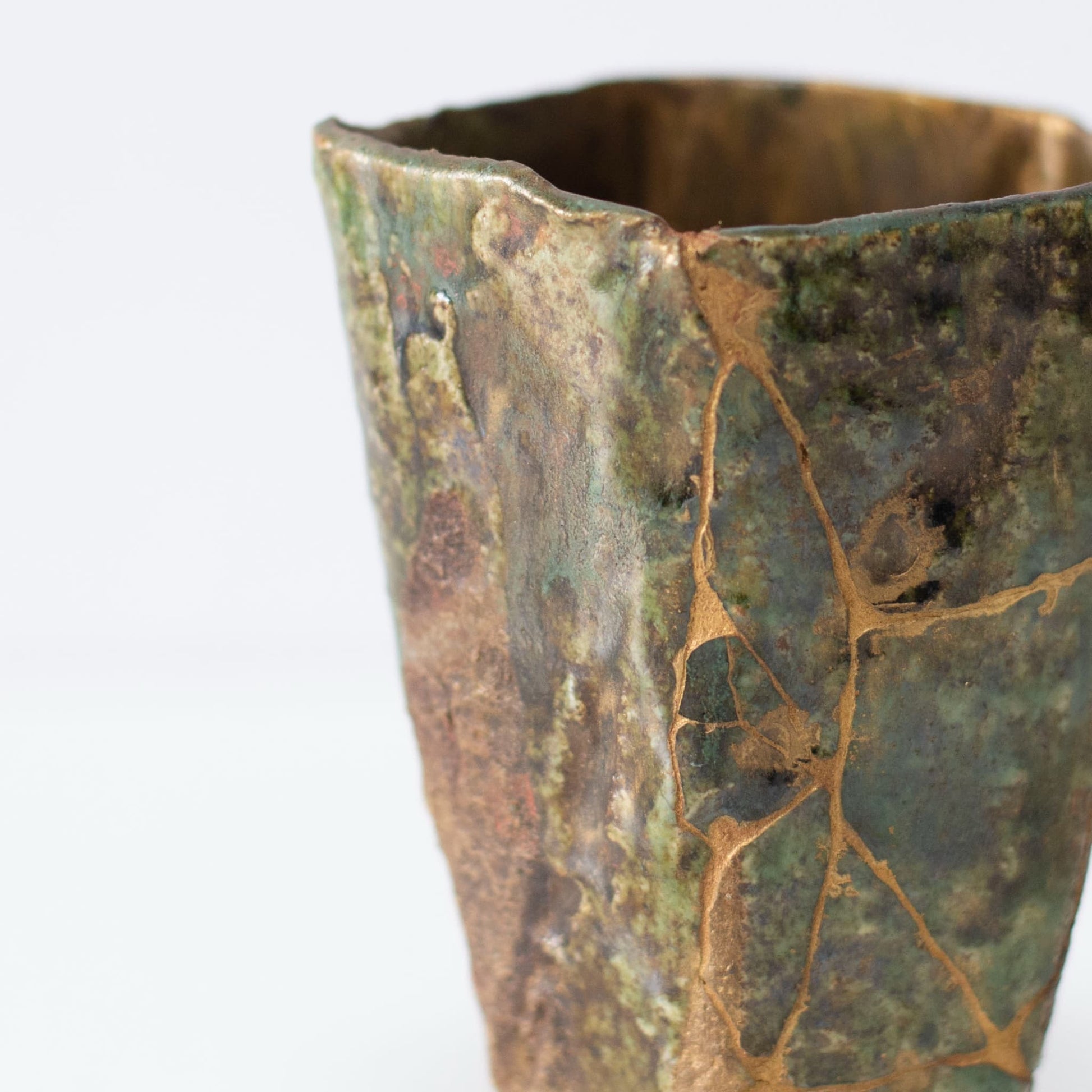Close-up of Kintsugi repair on Pentagon Kintsugi Cup "Oribe" Deep Green 02