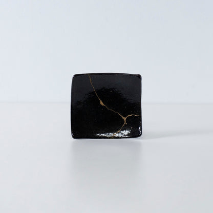 Side view of Kintsugi Square Plate "Jet Black Lighting" 05 in a white background