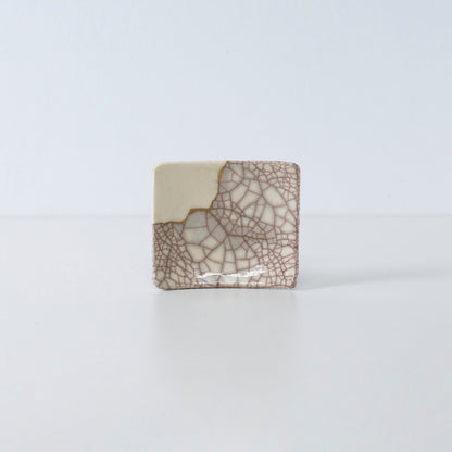 Side view of Kintsugi Square Plate "Vermilion Crackle" 04 in a white background