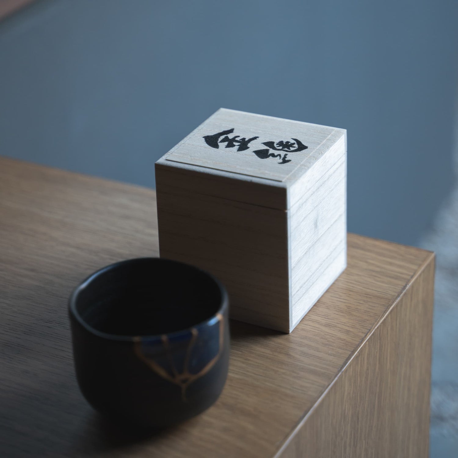 Jet-black Japanese tea bowl with Kintsugi box