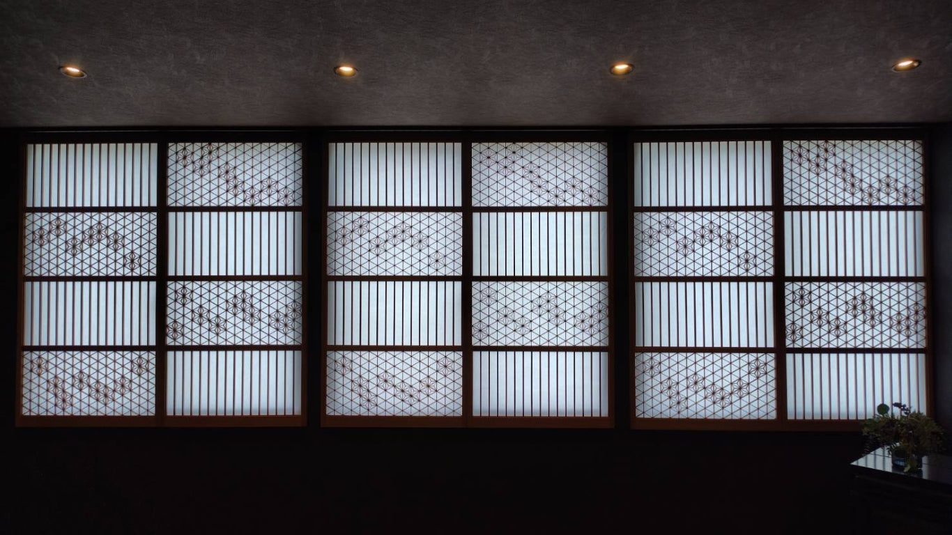 Six-paneled large horizontal window featuring traditional Japanese Kumiko-zaiku decorative woodwork.