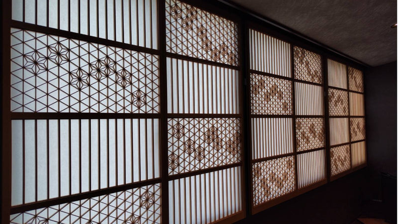 Six-paneled large horizontal window featuring traditional Japanese Kumiko-zaiku decorative woodwork.