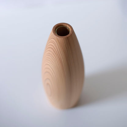 Japanese cedar vase on a white table